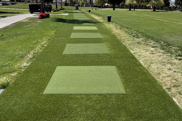 Naperville Outdoor tee line with light green synthetic grass boxes inside a dark green synthetic grass strip